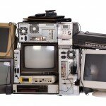 Old, used and obsolete electronic equipment isolated on white